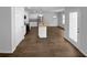 Bright kitchen featuring white cabinets, granite counters, stainless steel appliances, and an island sink at 280 Mcgiboney Ln, Covington, GA 30016