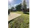 Backyard featuring a trampoline and a concrete patio area at 2895 Dominion Walk Ln, Snellville, GA 30078
