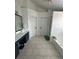 Large bathroom with double sink vanity, soaking tub, and separate shower at 2895 Dominion Walk Ln, Snellville, GA 30078