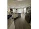 Modern kitchen with stainless steel appliances, granite countertops, and ample cabinet space at 2895 Dominion Walk Ln, Snellville, GA 30078
