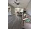 Cozy living space with stylish sofas, a large window, and views to the dining room at 2895 Dominion Walk Ln, Snellville, GA 30078