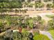 Aerial view of a treelined golf course and homes in the distance at 4449 Lashley Dr, Tucker, GA 30084