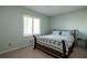 Bedroom features a bed with decorative throw pillows and a decorative throw at 4449 Lashley Dr, Tucker, GA 30084