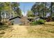 Exterior showcasing the home, yard, and patio area at 4449 Lashley Dr, Tucker, GA 30084