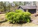 Home exterior with beautiful landscaping and inviting backyard at 4449 Lashley Dr, Tucker, GA 30084