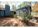 Exterior view of home with architectural facade and wood beam entryway at 4449 Lashley Dr, Tucker, GA 30084