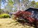 Exterior view showcasing a well-maintained home with lush landscaping at 4449 Lashley Dr, Tucker, GA 30084