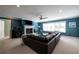 Large living room with fireplace, big windows, ceiling fan and recessed lights at 4449 Lashley Dr, Tucker, GA 30084
