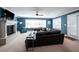 Spacious living room with a fireplace and plenty of natural light from large windows at 4449 Lashley Dr, Tucker, GA 30084