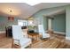 Open living space with chairs and a dining room visible in the background at 4449 Lashley Dr, Tucker, GA 30084