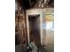 Interior of a house under renovation, showcasing new door frames and exposed framework at 852 Laurelmont Dr, Atlanta, GA 30311