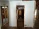 Interior view of a house under renovation, showing unfinished walls at 852 Laurelmont Dr, Atlanta, GA 30311