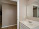 Bathroom featuring a sink and a mirror at 10104 Fairington Ridge Cir, Lithonia, GA 30038
