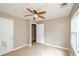 Bedroom with tile flooring and a ceiling fan at 10104 Fairington Ridge Cir, Lithonia, GA 30038