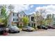 Exterior view of a multi-story apartment building with ample parking and surrounding landscaping at 10104 Fairington Ridge Cir, Lithonia, GA 30038