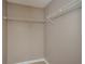 This walk-in closet features two white wire shelves at 10104 Fairington Ridge Cir, Lithonia, GA 30038