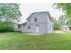 Large backyard with a concrete patio and a storage building at 3891 Northstrand Dr, Decatur, GA 30035