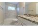 Bathroom featuring marble shower, countertop, sink, and cabinet at 3891 Northstrand Dr, Decatur, GA 30035