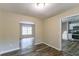 Dining area featuring wood-look floors, neutral walls, and ample natural light at 3891 Northstrand Dr, Decatur, GA 30035
