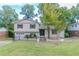 Charming two-story home with a well-manicured lawn and mature trees at 3891 Northstrand Dr, Decatur, GA 30035