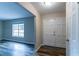 Inviting foyer with wood-look floors and a double-door closet at 3891 Northstrand Dr, Decatur, GA 30035