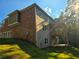 Beautiful home showcasing a mix of brick and siding with a covered deck at 7580 Sunridge Ln, Douglasville, GA 30135
