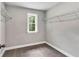Empty walk-in closet with a window and wire shelving at 7580 Sunridge Ln, Douglasville, GA 30135