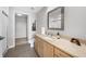 Bathroom featuring a vanity, a large mirror, and a shower with glass door at 563 Memorial Se Dr # 504, Atlanta, GA 30312