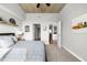 Cozy bedroom with carpet, gray walls, a comfortable bed and access to other rooms at 563 Memorial Se Dr # 504, Atlanta, GA 30312