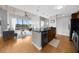 Sleek kitchen featuring a large island, stainless steel appliances, and hardwood floors at 563 Memorial Se Dr # 504, Atlanta, GA 30312