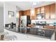 Contemporary kitchen showcasing granite counters, stainless appliances, and bright lighting for a modern feel at 563 Memorial Se Dr # 504, Atlanta, GA 30312
