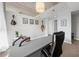 Modern office space with a large ceiling fan, artwork, and unique guitar decorations at 563 Memorial Se Dr # 504, Atlanta, GA 30312