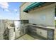 Outdoor kitchen with stainless grill and countertop space at 563 Memorial Se Dr # 504, Atlanta, GA 30312