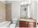 Bathroom featuring vanity with granite counters and built-in tub at 900 River Vista Dr, Atlanta, GA 30339