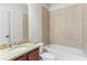 Cozy bathroom with granite counter, bathtub, shower and tiled walls at 900 River Vista Dr, Atlanta, GA 30339