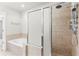 Modern bathroom with shower stall, soaking tub and stylish tile surround at 900 River Vista Dr, Atlanta, GA 30339