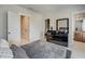 Bedroom with a platform bed, neutral walls, and access to the ensuite bathroom at 900 River Vista Dr, Atlanta, GA 30339