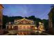 Elegant clubhouse exterior featuring a distinctive design and manicured surroundings at 900 River Vista Dr, Atlanta, GA 30339
