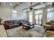 Comfortable living area with coffered ceilings, and a large rug at 900 River Vista Dr, Atlanta, GA 30339