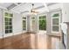 Bright living room with a fireplace, coffered ceilings and windows letting in lots of natural light at 900 River Vista Dr, Atlanta, GA 30339