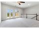 Second floor lofted living space with balcony access at 900 River Vista Dr, Atlanta, GA 30339
