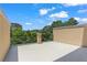 Spacious outdoor patio with black iron railings and views of lush greenery at 900 River Vista Dr, Atlanta, GA 30339