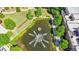 Aerial view of a pond with a fountain surrounded by green spaces and apartments at 900 River Vista Dr, Atlanta, GA 30339