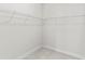Walk-in closet with basic wire shelving for optimal storage at 900 River Vista Dr, Atlanta, GA 30339