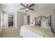 Bedroom featuring a wrought iron bed frame and ensuite bathroom at 1384 Doublegate Dr, Brookhaven, GA 30319