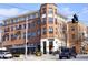 Brick building with large windows and balconies, street view with shops and restaurants at 1384 Doublegate Dr, Brookhaven, GA 30319