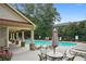 Relaxing community pool area with comfortable lounge seating and shaded spots at 1384 Doublegate Dr, Brookhaven, GA 30319