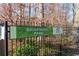 Briarwood Park community sign against a backdrop of trees and foliage at 1384 Doublegate Dr, Brookhaven, GA 30319