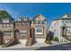 Beautiful townhome with brick facade, multiple windows, and attached garages at 1384 Doublegate Dr, Brookhaven, GA 30319