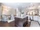 Modern kitchen area featuring a central island, stainless steel appliances, and pendant lighting at 1384 Doublegate Dr, Brookhaven, GA 30319